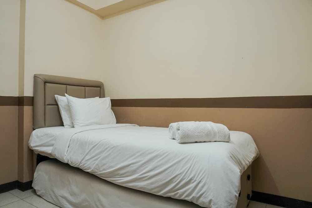 Homey and Compact 2BR Pluit Sea View Apartment