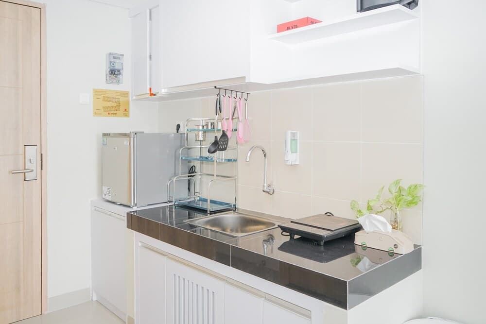 Homey and Minimalist Studio Padina Apartment