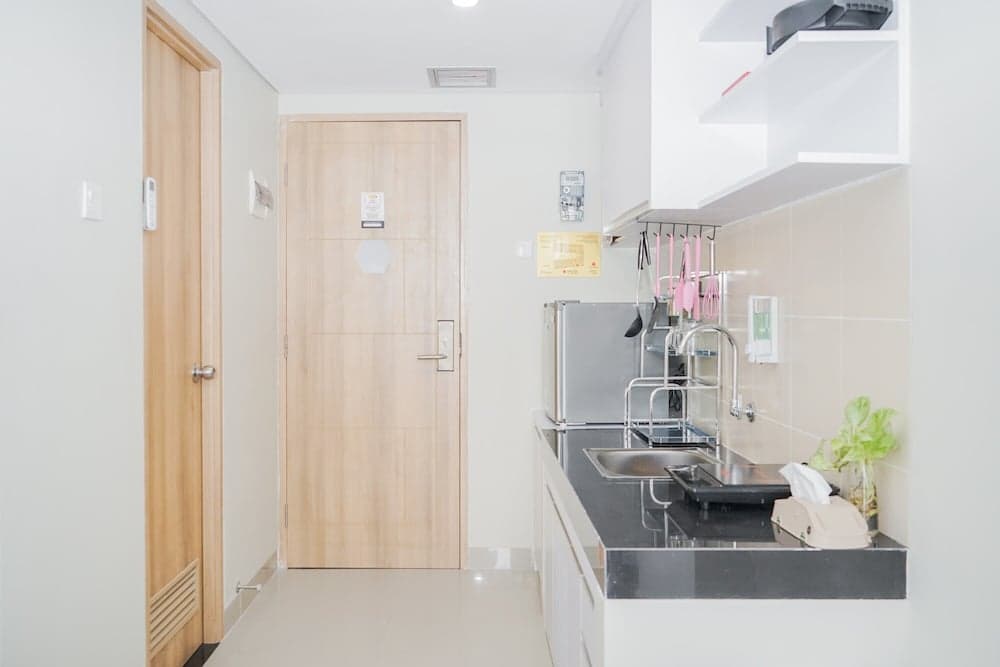 Homey and Minimalist Studio Padina Apartment