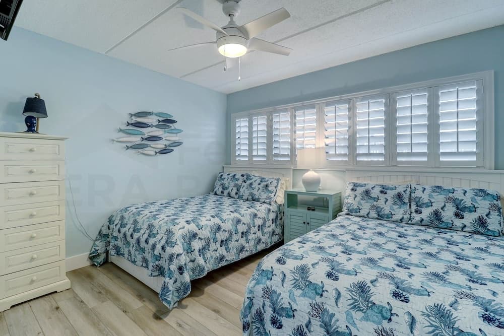 Spotted Sandpiper Condo Easy access to Pier, Pool and Beach Access are Steps Away by RedAwning