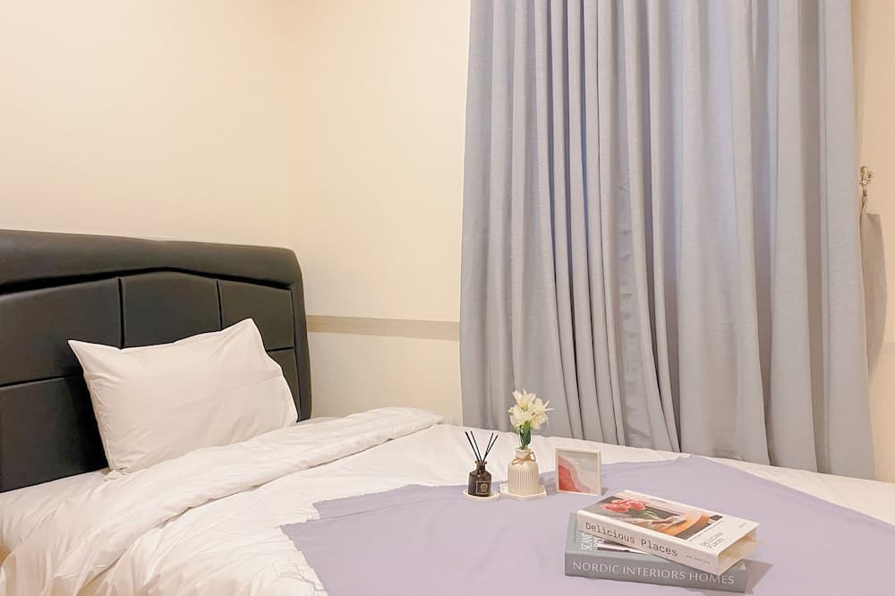 Modern 2BR Room at Meikarta Apartment By Travelio