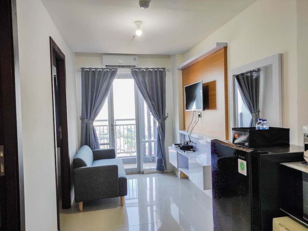 Homey and Comfy 2BR at Vida View Apartment