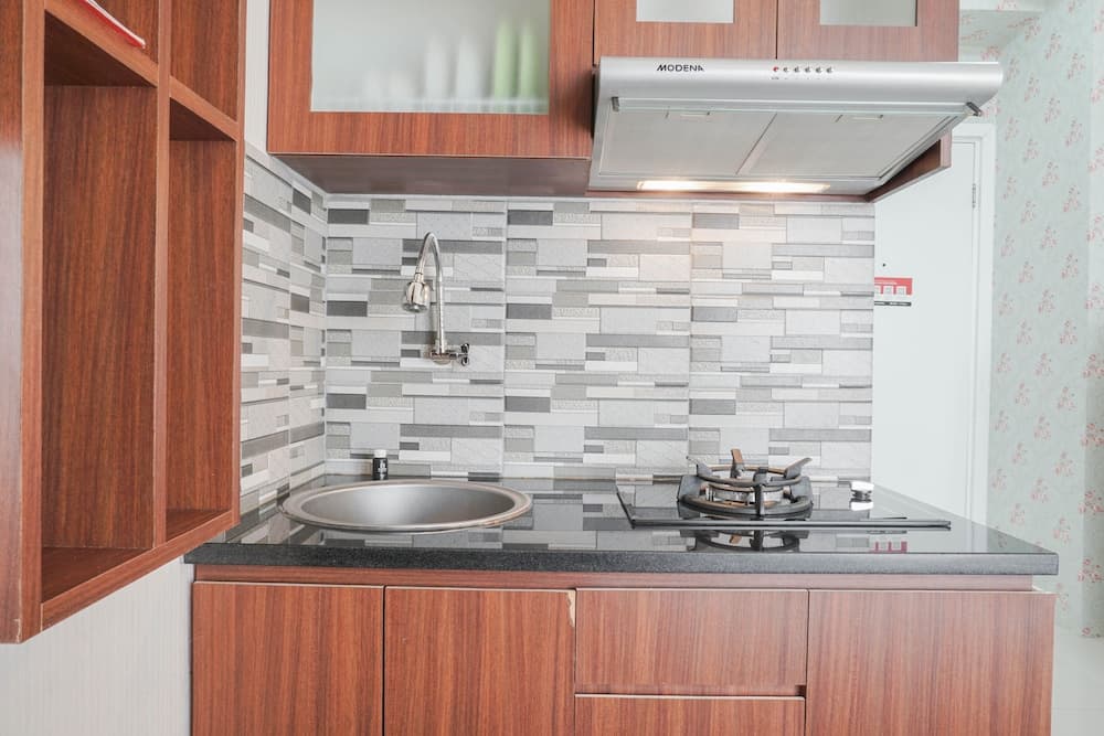 Modern Studio at Green Pramuka City Apartment