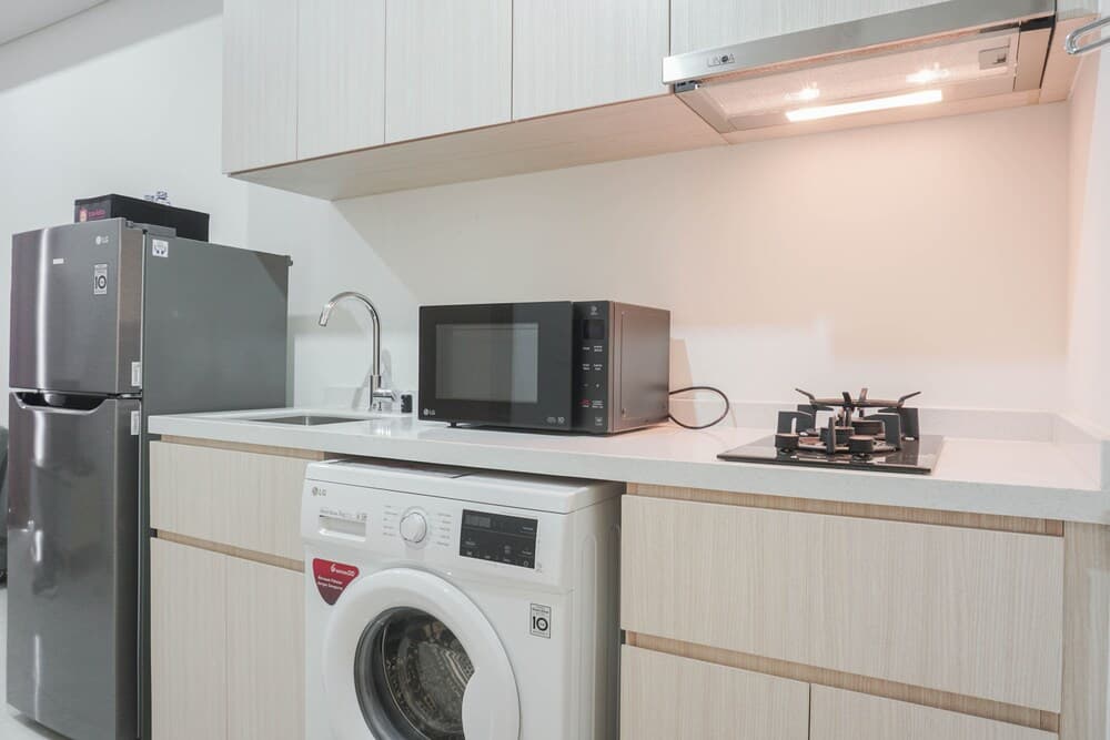 Comfy 1BR Sedayu City Suites Apartment