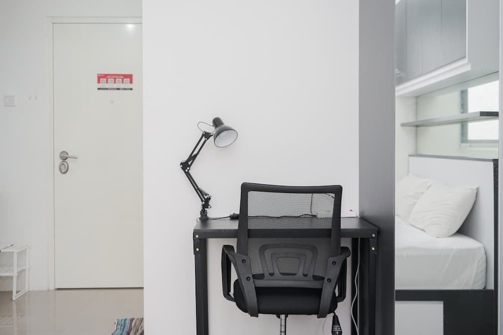 Cozy and Homey Studio at Silk Town Apartment