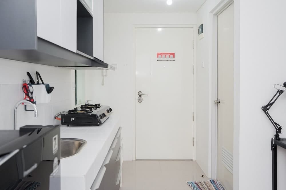 Cozy and Homey Studio at Silk Town Apartment