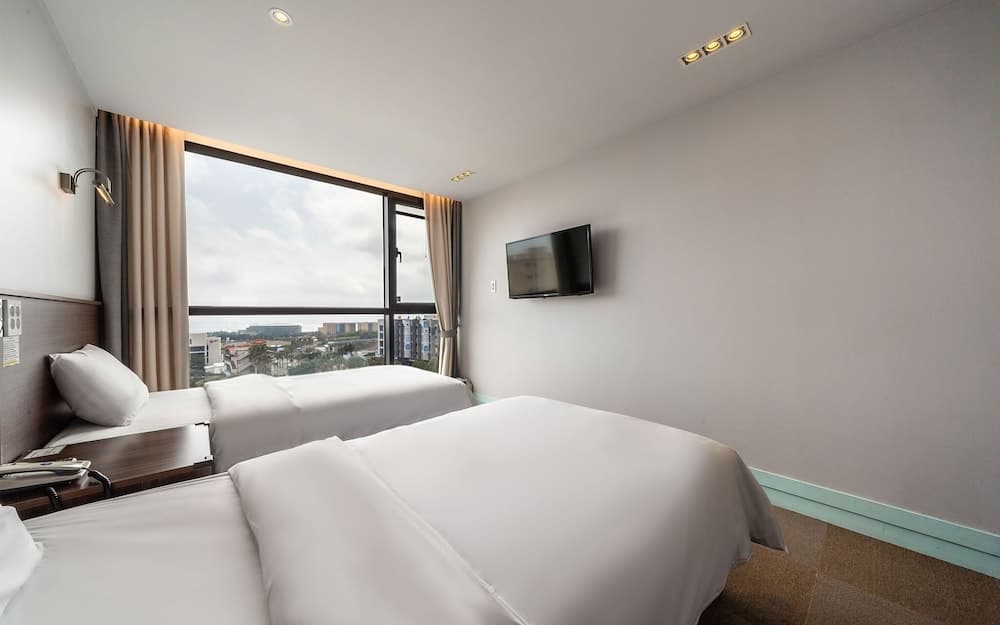 Seogwipo Sunrise Hotel Jungmun