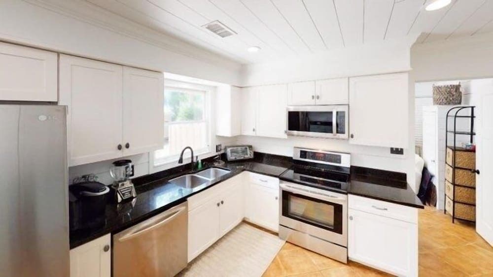 Beach Blossom - Bright, Updated Unit with Hot Tub on Patio by RedAwning