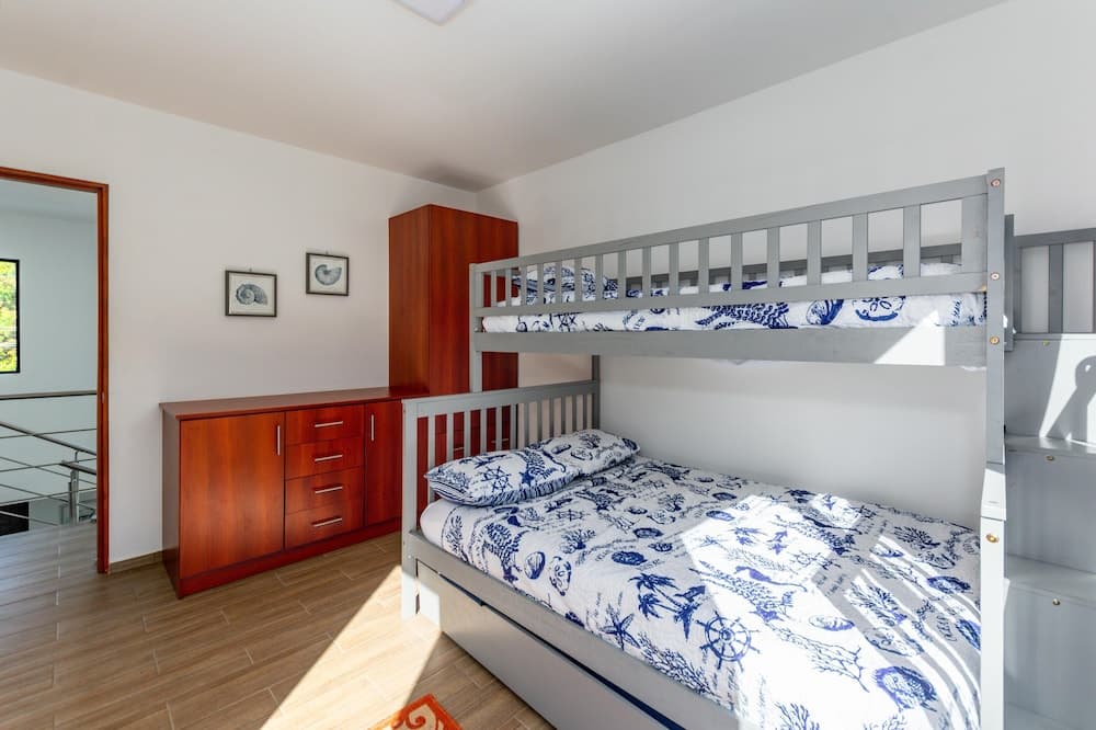 Ultramodern Townhome with an Inviting Coastal Design and Lush Outdoor Oasis with a Private Pool