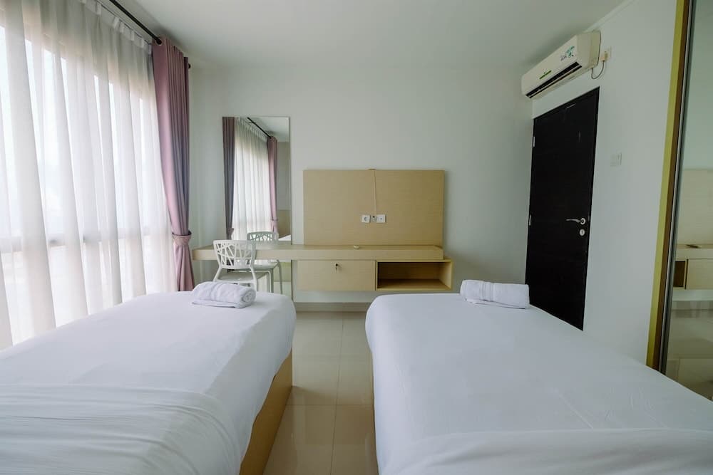Cozy 2BR Apartment with Sofa Bed at Tamansari Semanggi