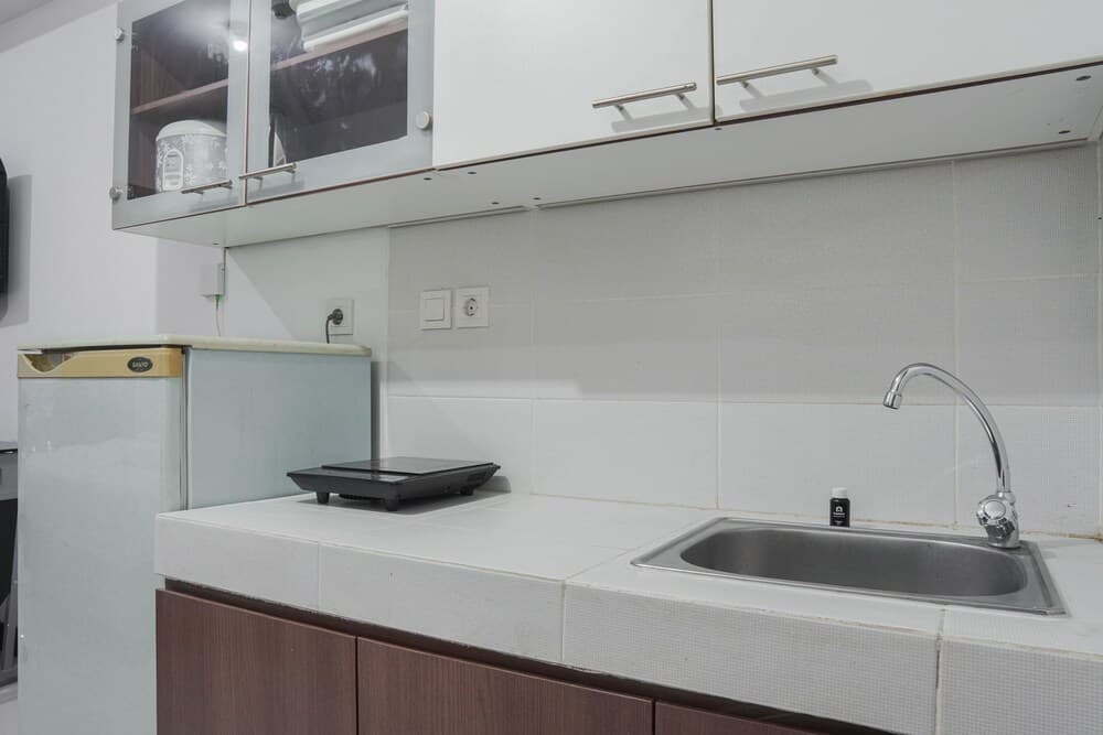 Homey and Nice Studio Apartment at Scientia Residence