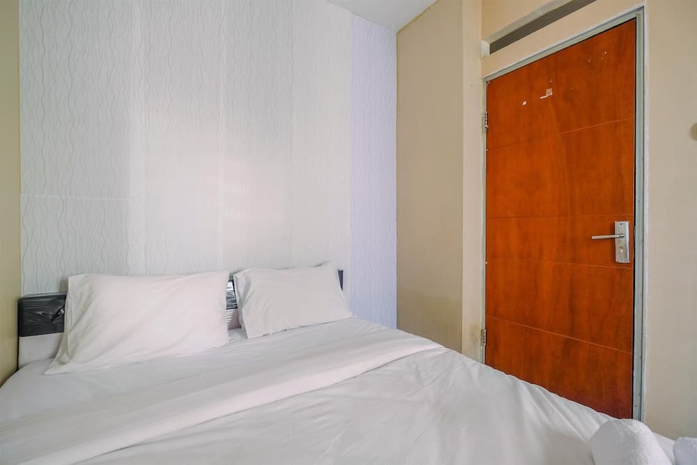 Homey and Compact 2BR Cibubur Village Apartment