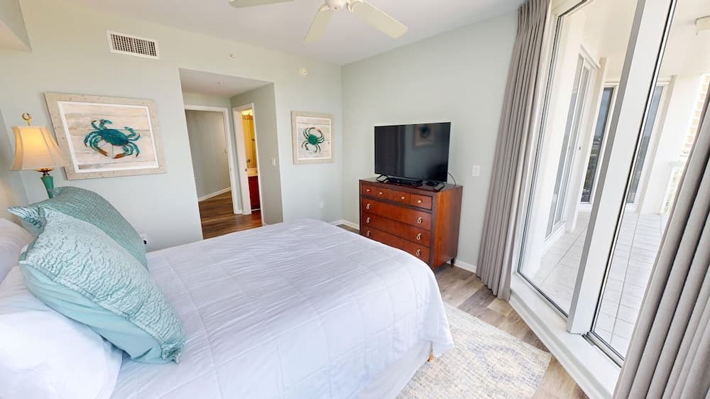 Silver Beach 506 is a gorgeous Gulf Front 4 BR with free beach service - sleeps 8 by RedAwning