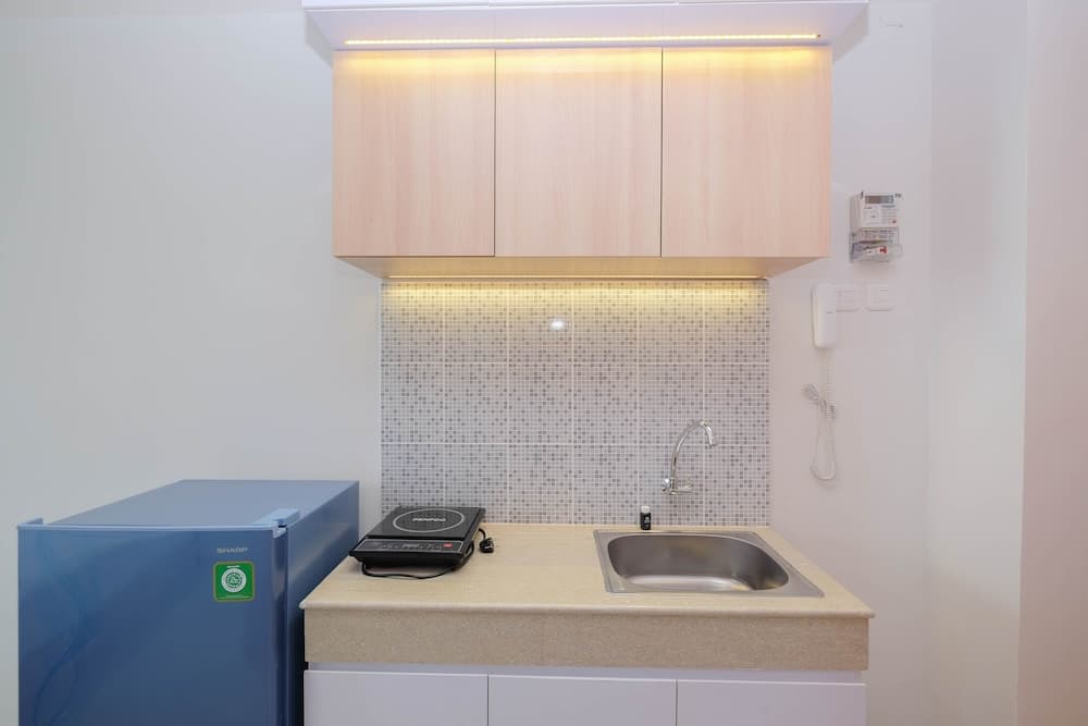 Comfort and Strategic Studio at Evenciio Apartment near Campus Area