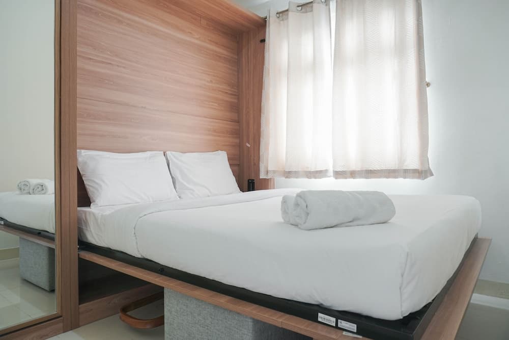 Restful and Tidy 2BR at Green Pramuka City Apartment