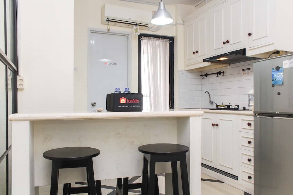White and Nice 1BR at Bassura City Apartment