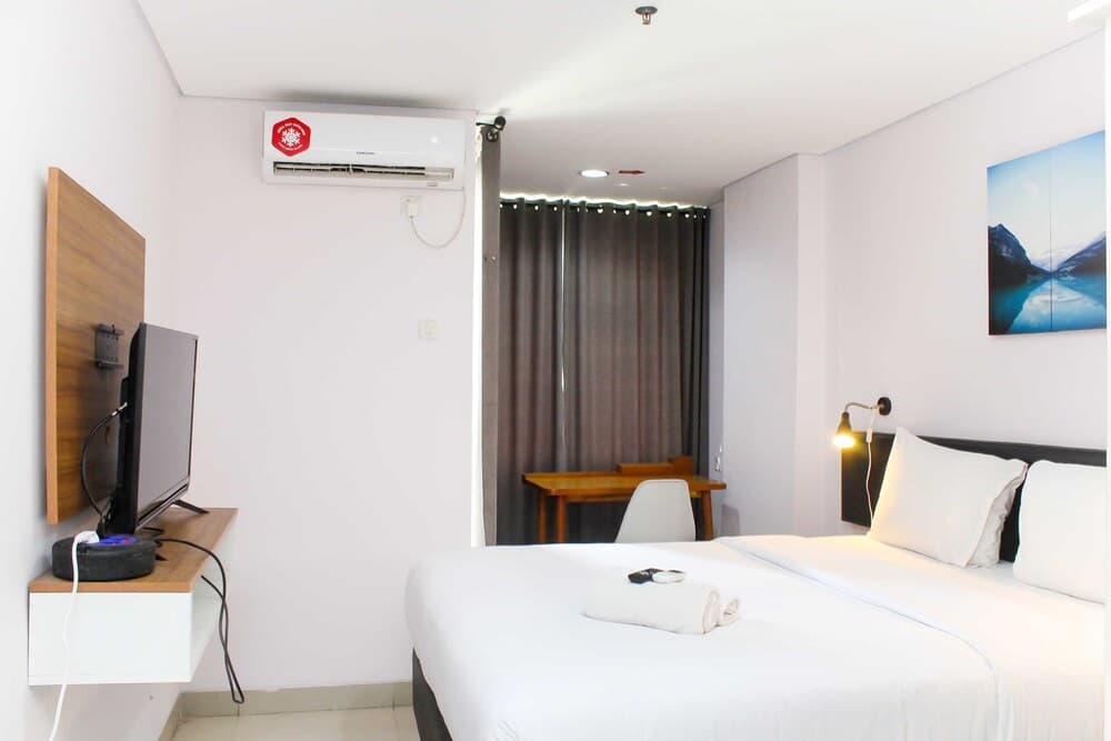 Homey And Simply Studio Room At Enviro Apartment