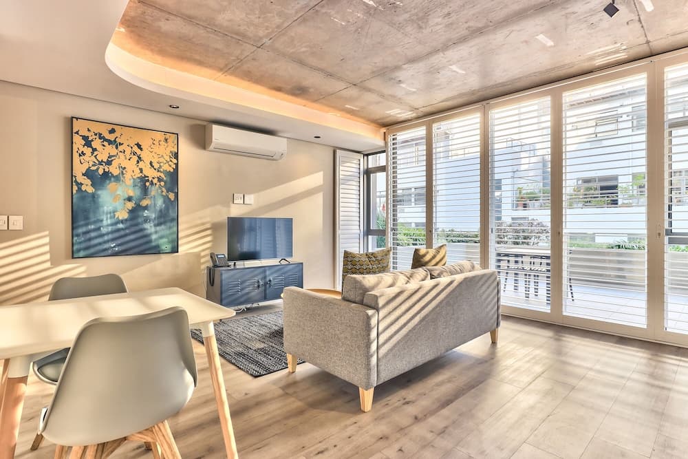 One Bedroom With Balcony and City Views