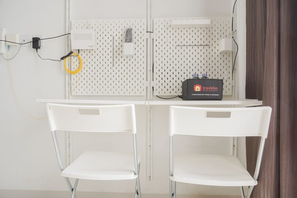 Homey and Cozy Living Studio Room at Dave Apartment