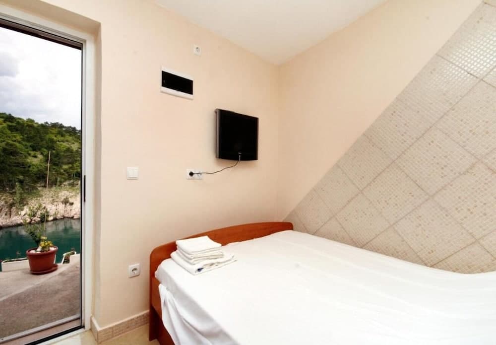 Bernardica - on Cliffs Above sea - H