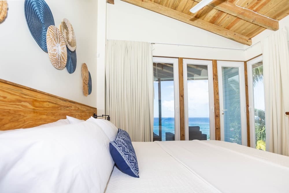 Awesome Over The Water Overlooking West End - Aire Agua 3 Bedroom Home by RedAwning