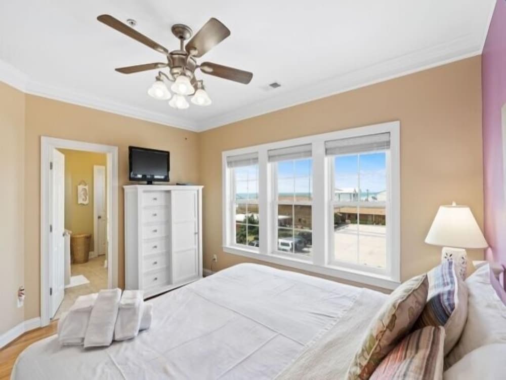 Kure Beach Villa - Enjoy Three Levels Of Luxury! Outdoor Pool And Garage Parking! 2 Bedroom Townhouse by RedAwning