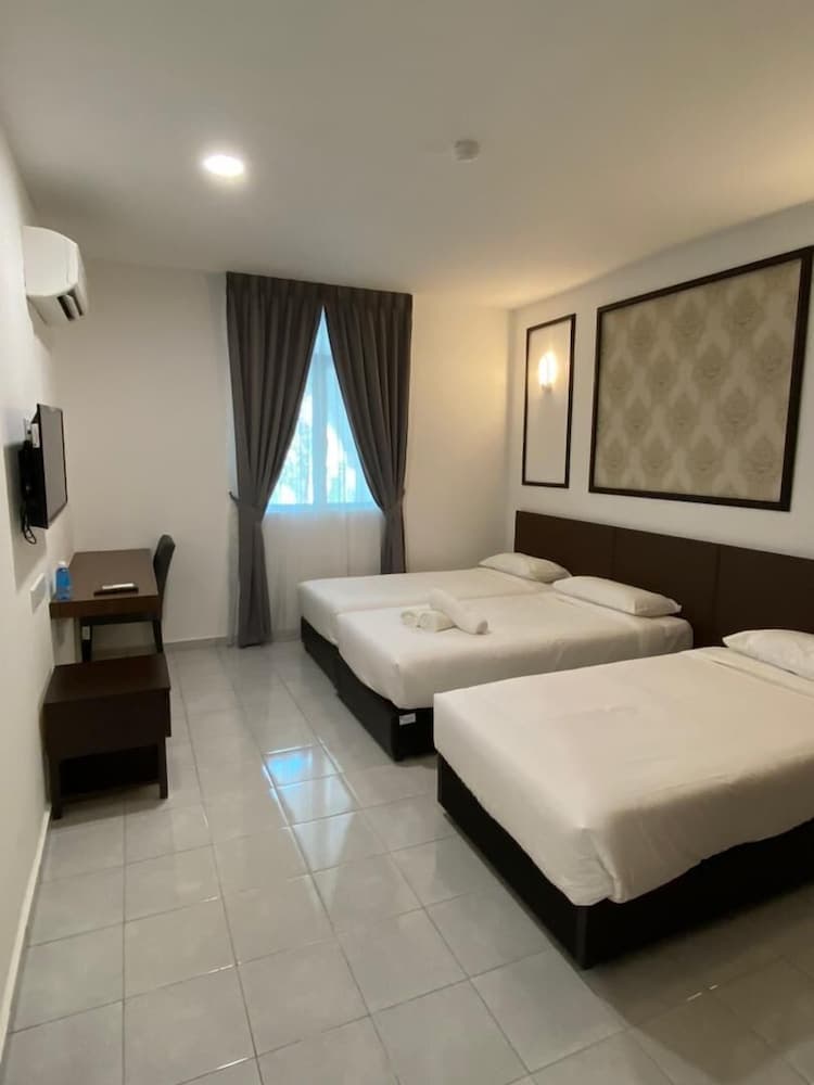 Cafe & Capital O 90756 Cara Hulu Hotel