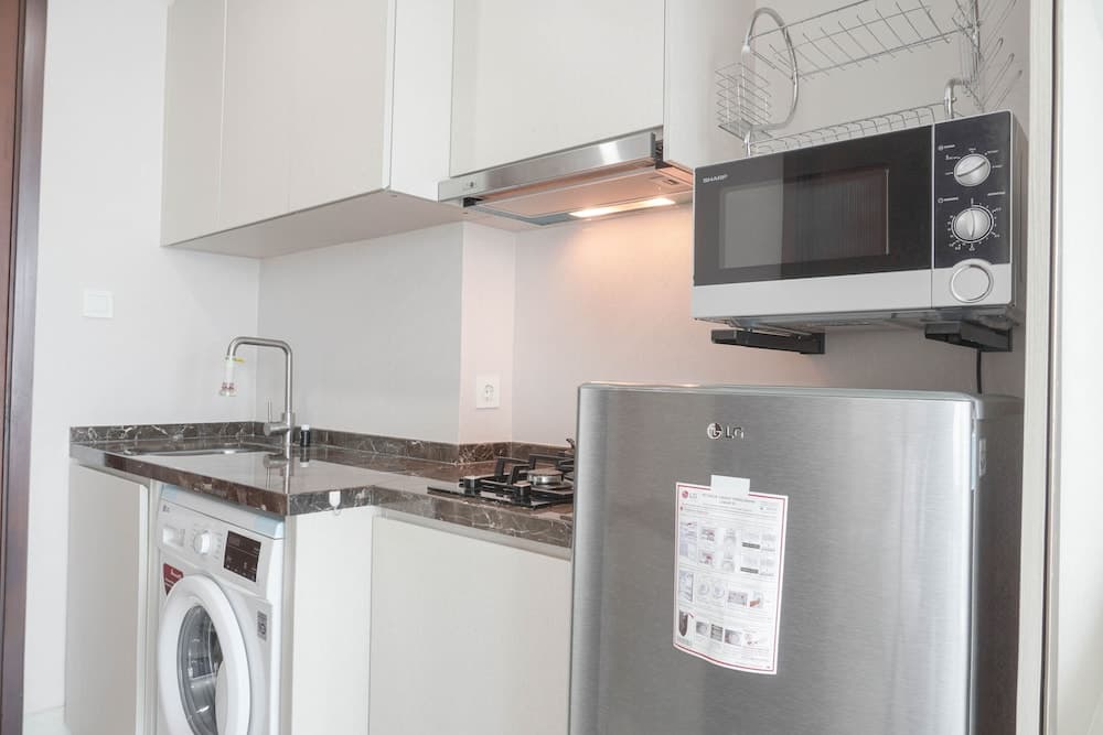 Warm And Comfort Studio Room At Green Sedayu Apartment