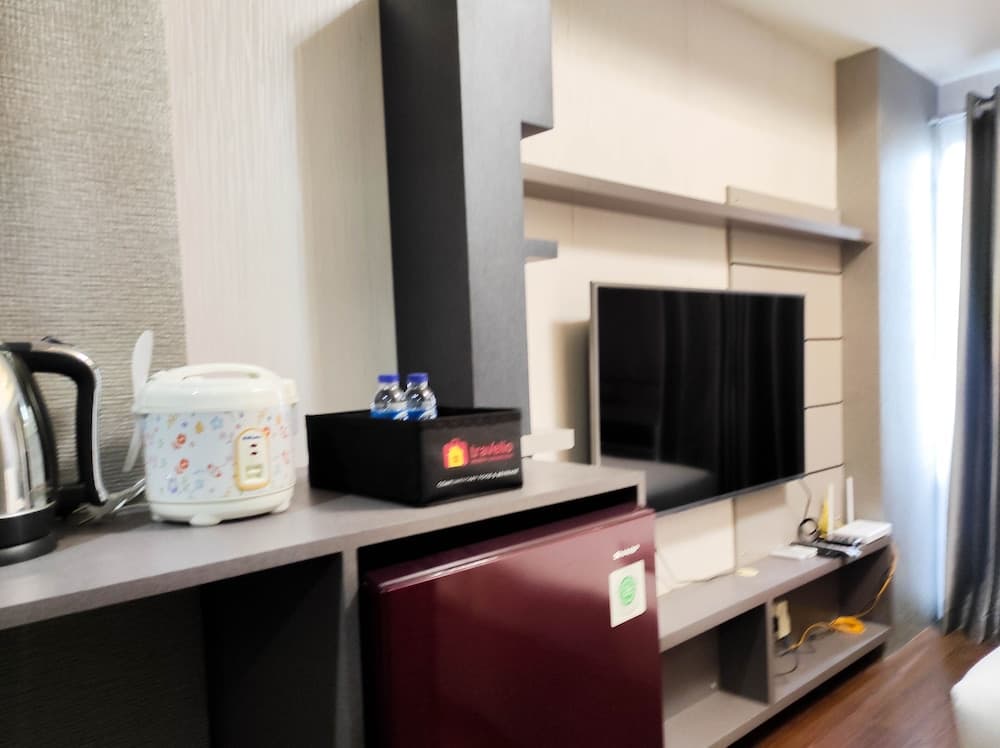 Nice And Elegant Studio At Vida View Makassar Apartment