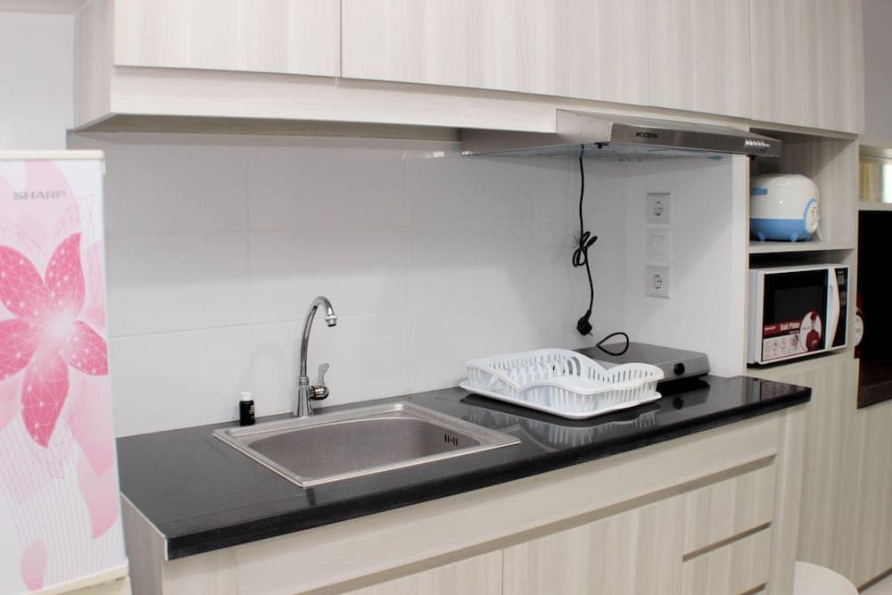 Comfort And Minimalist Studio At Azalea Suites Apartment