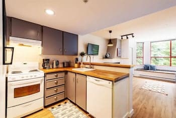 Cozy Creekside Two-Storey Condo