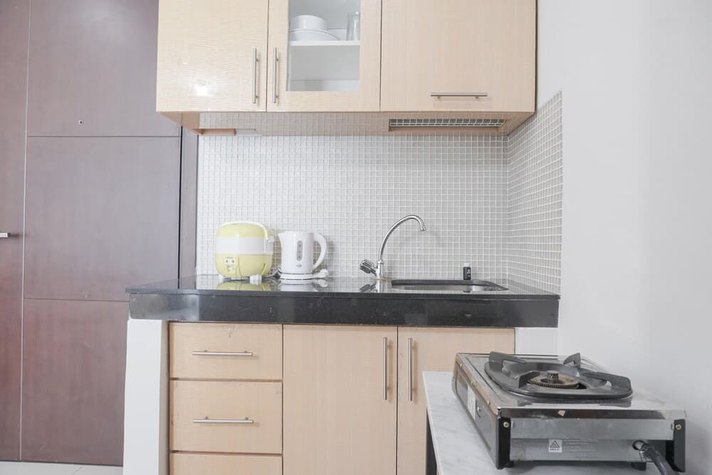 Comfort And Cozy 1Br At Sky Terrace Apartment