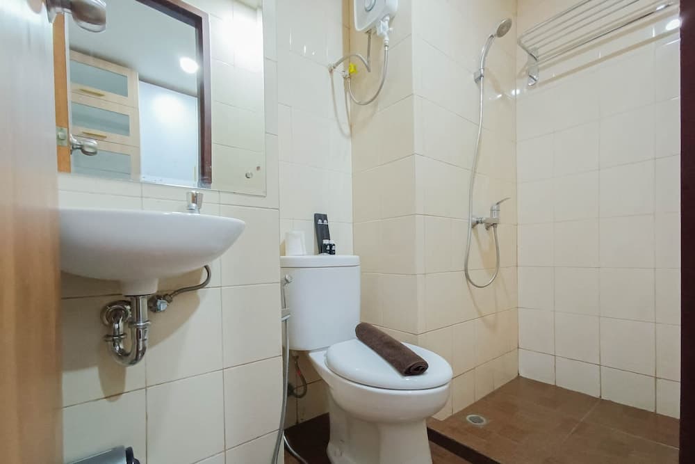 White And Cozy Studio At Vida View Makassar Apartment