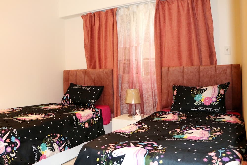 Red Flower in Palm City Compound 1 Hour to the sea