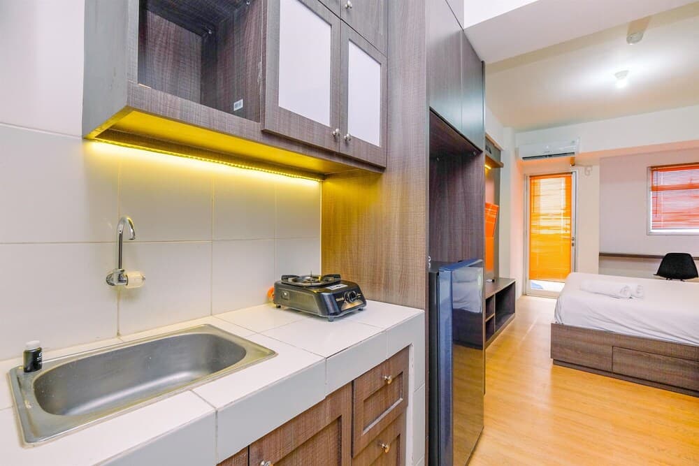 Minimalist And Homey Studio At Gunung Putri Square Apartment