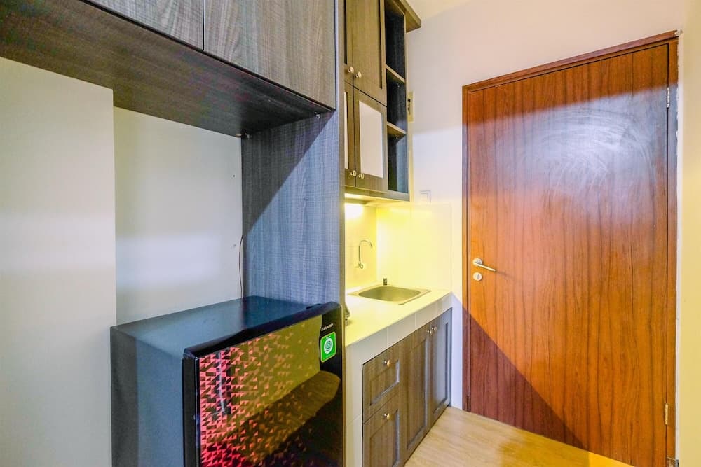 Homey And Tidy Studio At Gunung Putri Square Apartment