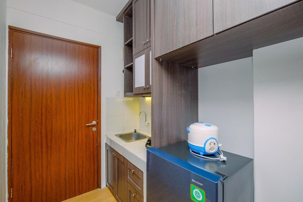 Minimalist And Warm Studio At Gunung Putri Square Apartment