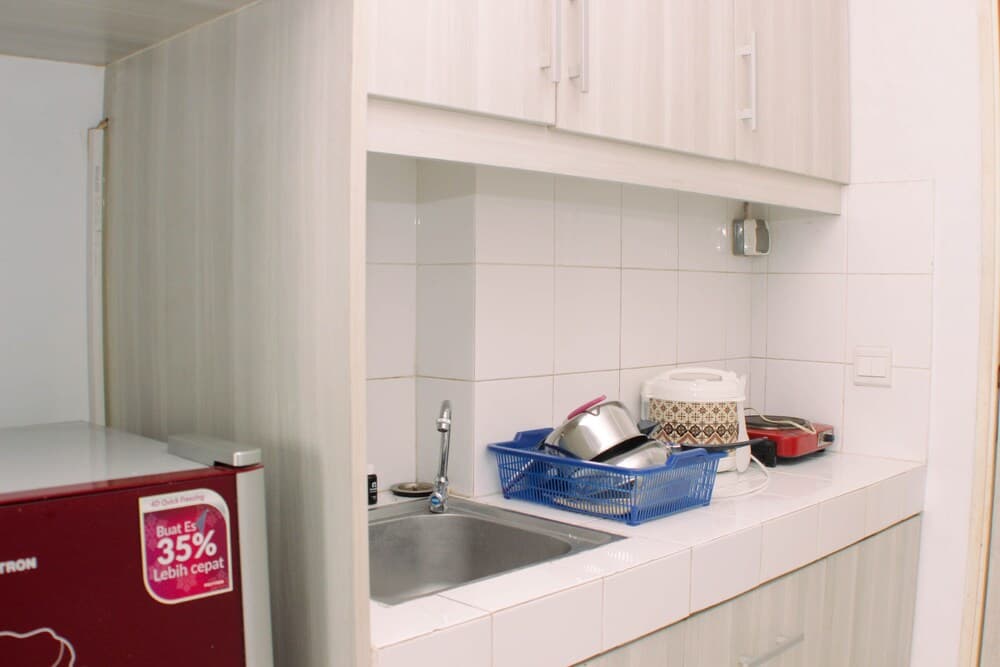 Warm And Simply Studio Room At Azalea Suites Apartment