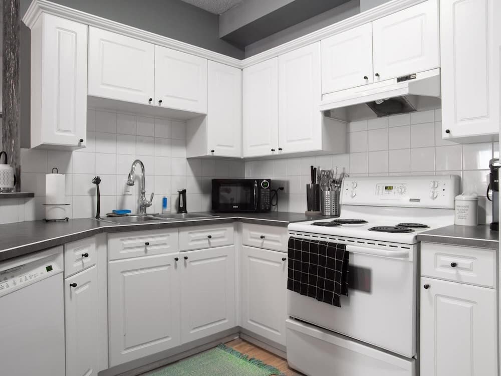 Fun and Colourful Condo w Foosball Parking Coffee