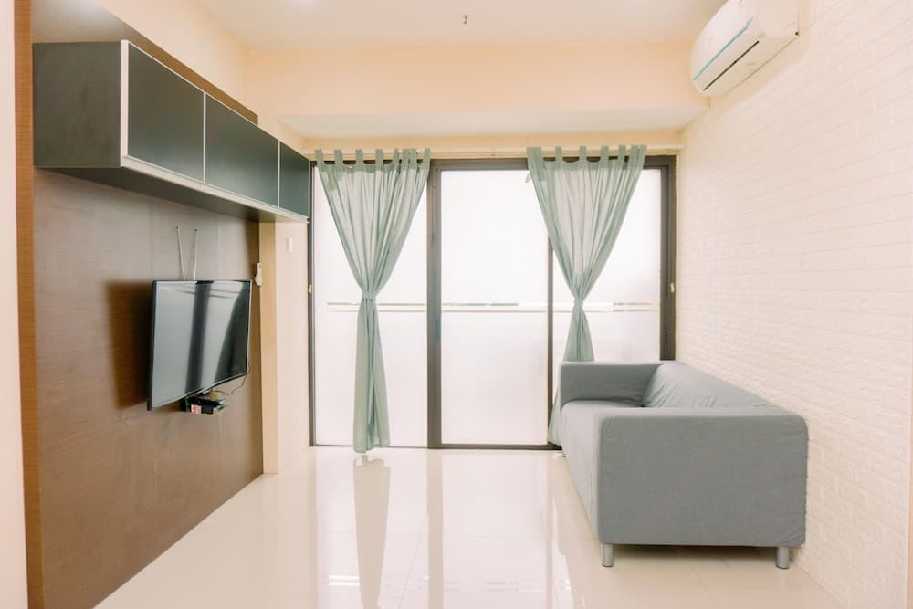 Minimalist And Homey 1Br At Puri Garden Apartment