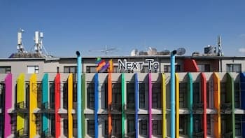 Next To Apartment Hotel