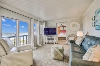 Pinnacle Port A502 - Updated 3 Bedroom . Free Fun! Boat Ramp Access! Condo by Redawning