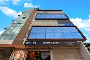 Fabhotel Dhanvitha Suites