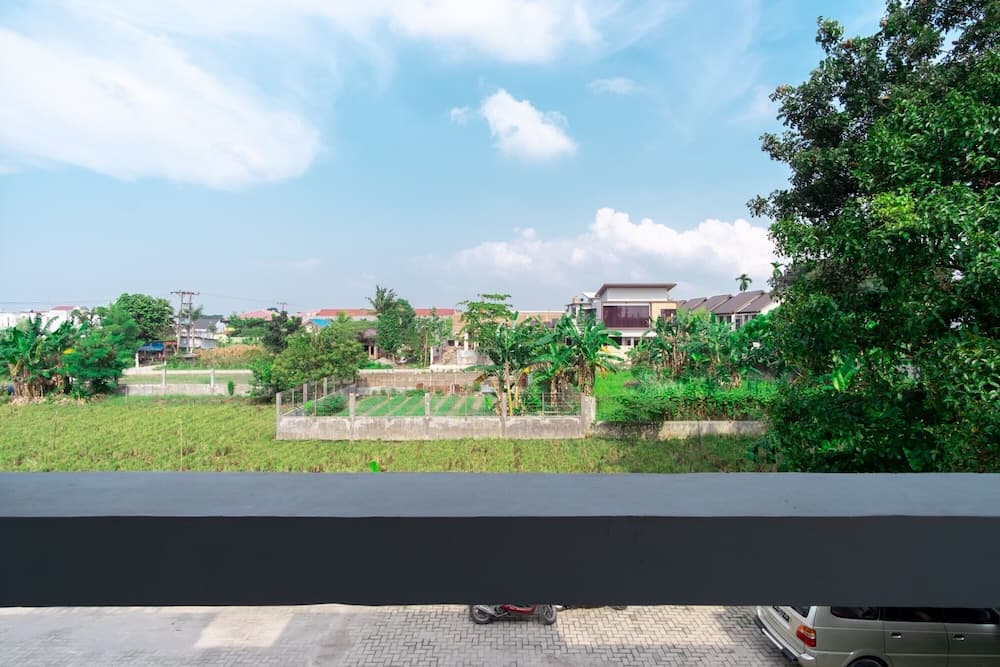 Capital O 92444 Kamojo Guest House