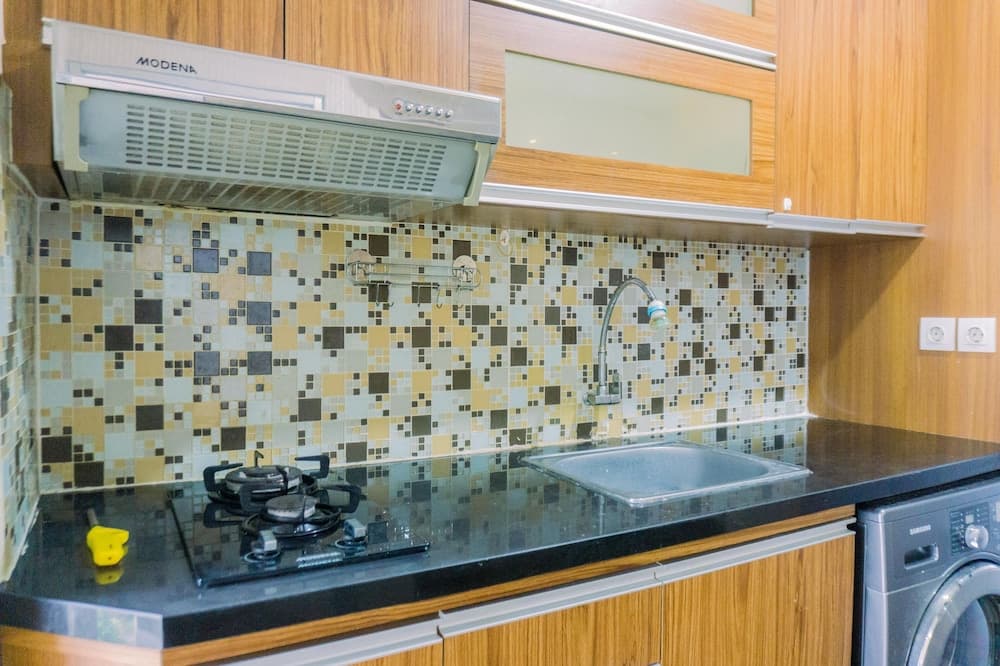 Cozy Stay And Tidy 1Br Green Bay Pluit Apartment