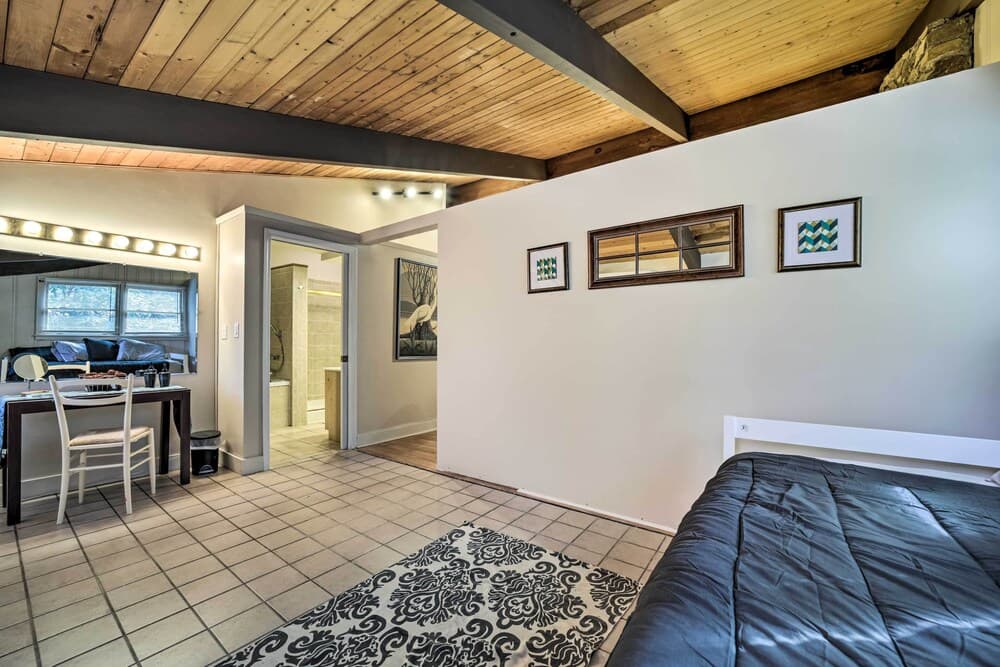 Forested Family Retreat w/ Wraparound Deck & Patio