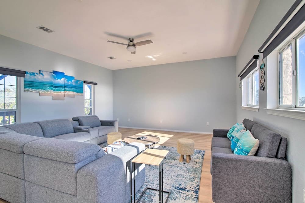 Sunny Lakefront Escape w/ Private Beach & Deck