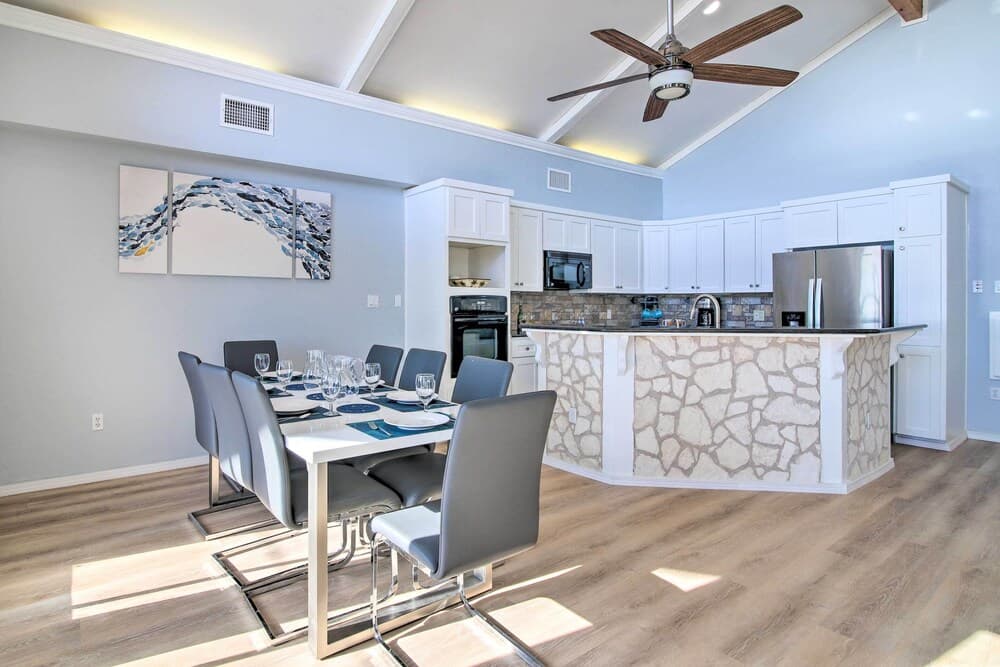 Sunny Lakefront Escape w/ Private Beach & Deck