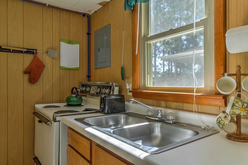Lakefront Studio Cabin w/ Dock & Fire Pit!