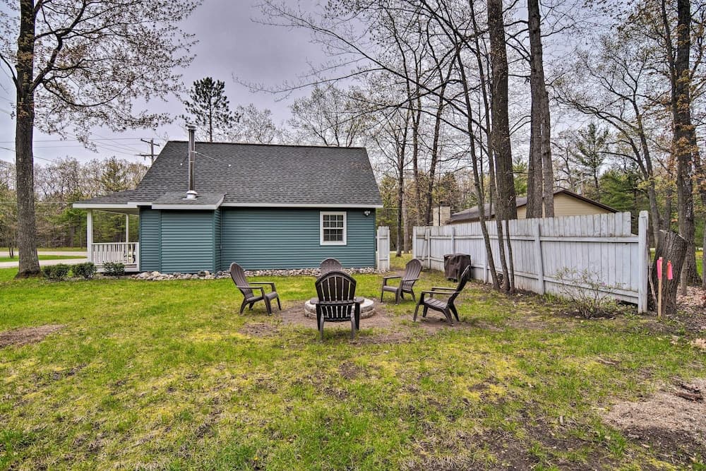 Higgins Lake Area Cabin w/ Fire Pit & Yard!